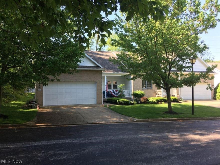 Highly desired Ridgewood Condominiums. Last unit on a dead end street borders a wooded area. Wonderful floor plan features 2 bedrooms and 2 full baths. First floor laundry. Open loft with a skylight overlooks the great room/dining room/foyer... (which also could be used as a 3rd bedroom/office/craft room. Great room has a fireplace. Kitchen with eating area offers quality oak cabinetry. Kitchen appliances 2014 include stove, refrigerator, dishwasher. Updated windows and patio door 2014. Over sized deck off of great room. Nature stone garage floor 2012. Basement offers built in storage closets and cedar closet. Close to shopping, restaurants & freeway. Get away from yard work. Ridgewood is a wonderful community waiting for you to enjoy!