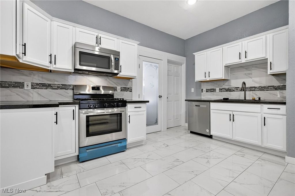 Photo of 2202 E 100th Street, Cleveland, OH 44106 (MLS # 5174527)