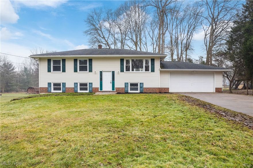 Wow! Check out this stunning home located in Springfield township! This showstopper has been fully updated and awaits a new owner! Featuring 4 bedrooms, 2 bathrooms, an attached 2 car garage and over 1,600 sqft this home is sure to impress! Updates include water heater, LVP flooring and carpet, kitchen appliances, 2 fully updated bathrooms, fresh paint in all rooms, and updated lighting! Enjoy the view of the half acre yard from the deck that can be accessed via the sliding glass door in the kitchen area. This home is conveniently located and allows quick and easy access to Springfield, Green, and Akron! Schedule your showing today!