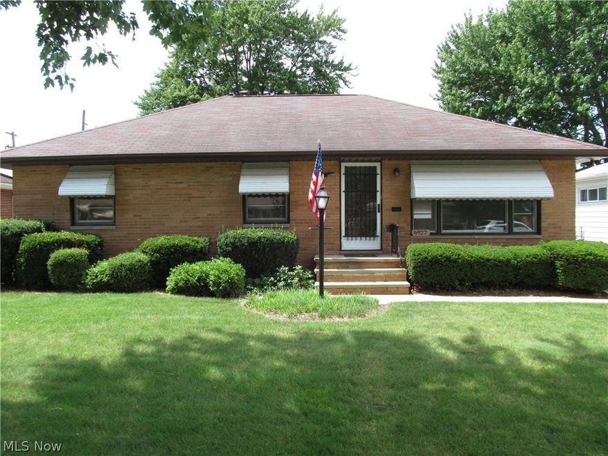 Be first or be sorry! Turn the key and move in! 2 owner home! Immediate possession! 3 bedroom, 1.5 bath brick ranch located on a quiet street. Neutral colors and beautiful hardwood floors throughout. Updated eat in kitchen features granite look-a-like counter tops. Formal dining room. Main bath updated with granite counter top and ceramic flooring. Full basement includes recreation room, laundry room, bonus room, glass block windows and workshop. Large fenced yard with covered patio. Newer roof. Updated hot water tank, furnace and garage door. 1 year HMS Home Warranty.