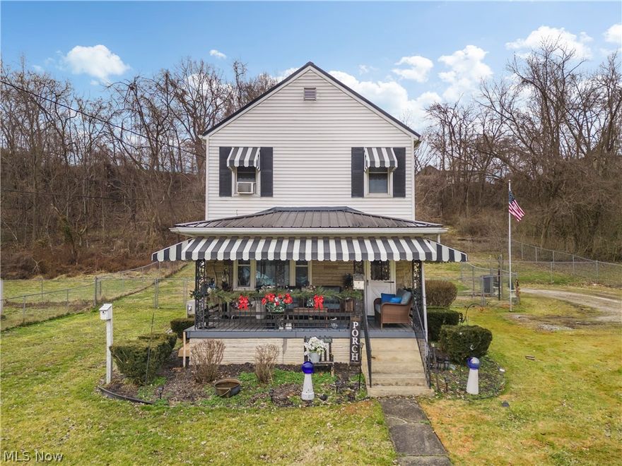 Welcome to 1312 Broadway Avenue! This comfy, well cared for 3 bedroom, 1.5 bath home will challenge the way you think of Broadway! From the moment you step inside, you'll appreciate the home's charming character. The kitchen is truly the highlight, featuring light colored cabinetry, a cheerful atmosphere, and a separate dining area perfect for every day meals or entertaining. There's new carpet throughout for a fresh, move in ready feel. Enjoy relaxing mornings on the covered front porch and evenings on the covered back patio overlooking the fenced back yard, perfect for pets. The home sits on a very generous 0.83 acre lot featuring a large flat front yard, the home sitting back off the road. Conveniently located while still offering privacy and space.