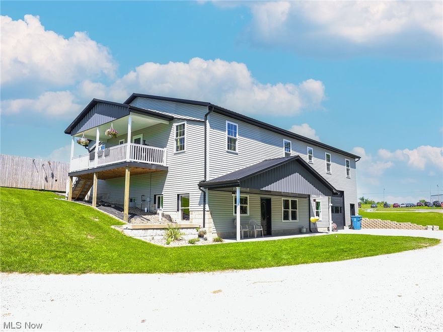 Property to be sold at Onsite Auction: Wednesday, October 18th at 5:00 PM. Welcome to this modern 3-bedroom, 3-bathroom home located just 2 minutes east of Mt Eaton. Settled on 8 acres, this 2017-built property offers country living yet ease of access. For those with animals, the expansive 36' x 40' barn, complete with an 8' overhang, is paired with 5.5 acres of fenced pasture. Inside, the home presents a spacious basement with extra-tall sidewalls and an overhead door that gives space for a garage. It features an additional kitchen, a third bathroom, bonus room and large open family room. The main floor, with its open concept layout, houses 3 bedrooms, 2 bathrooms, and a custom kitchen adorned with granite countertops. With 2,400 sq ft per floor there’s plenty of elbow room in this home. For utilities, the home is served by a private well and septic system. The property also comes equipped with a solar system, and the natural gas in-floor heating ensures consistent warmth across both levels. Offering location, acreage, and a newer home, here’s an opportunity that you won’t want to pass up!