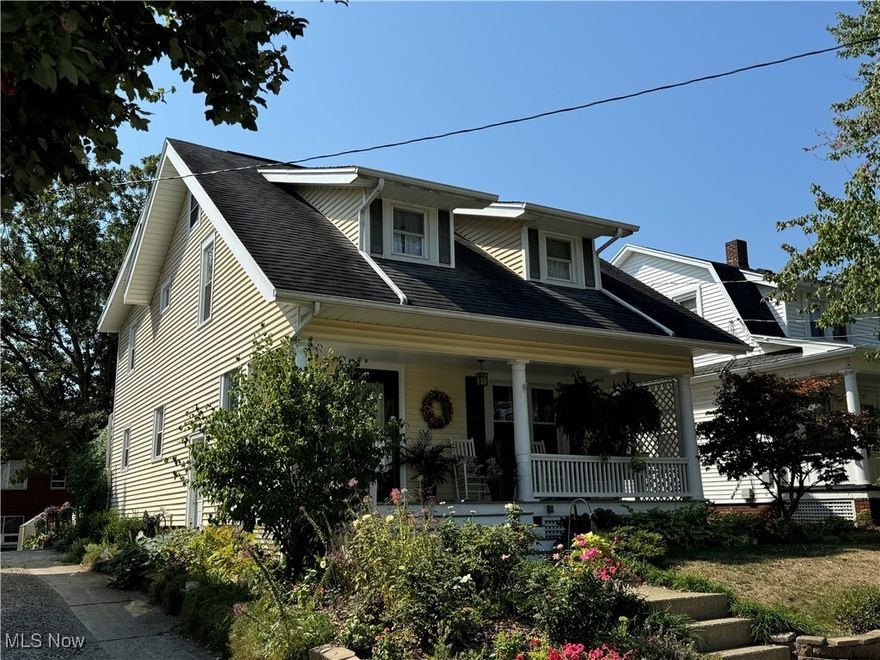 This Sears Craftsman home has been loved and meticulously maintained by its current owner since 1996.  Enter the home into a beautiful living room w/original woodwork, a dining room, recently renovated full bath w/1st floor laundry, kitchen with knotty alder cabinets & soft close drawers with maple inserts, and family room addition with cork flooring.  Kitchen appliances and 2nd basement refrigerator and freezer included.  Upstairs find a large master bedroom with a connecting office with built in shelving & cupboards, 2 other bedrooms and a 2nd full bath.  The basement has workshop space, and a newer furnace & c/a. The outside has a greenhouse, over 50 types of perennials, raspberry bushes, fountain, and covered front porch and back deck.  Oversized 1 car garage & carport.