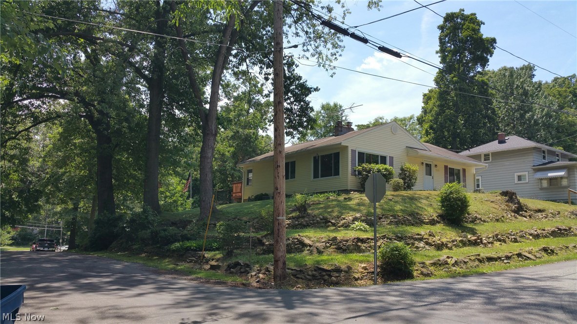 All one floor ranch with a beautiful view of portage lakes. You also have the ability at having your own dock to enjoy along with the beach.
this home has a finished walk out basement and the owner added an additional full bathroom also. So now you have 4 bedroom and 2 full bathrooms. There is a fireplace in the living room and a fireplace in the finished restroom in the lower level. Nice open kitchen that walks out to a nice oversized back deck with a great view. We also have a brand new built high school opening up this year. The elementary school and middle school have also been renovated. Dont pass this one up and miss out on a ranch home with lake privileges. Call for your private showing today! One year home warranty included