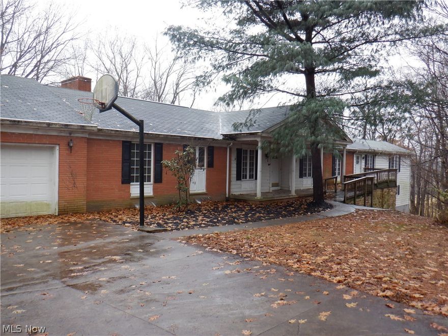 Large ranch home that has been added onto over the years with a walk out basement, indoor swimming pool, on a 3 acre wooded and ravined lot.  This is a Fannie Mae HomePath property.