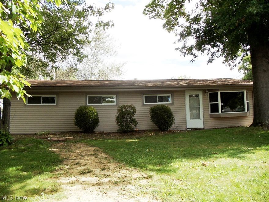 Nice 3 bedroom, 2 full bath ranch waiting to be yours!  Large fenced yard with deck and covered patio - great for entertaining. House has vinyl siding and newer vinyl replacement windows throughout. Remodeled kitchen, formal dining room, large living room with tons of natural light and vaulted ceiling, spacious bedrooms, 2 full baths. Oversized garage with large workshop/storage area. Great location. Close to tons of amenities and interstate access.  Sold as is. Buyer to assume any/all city POS violations, if applicable.