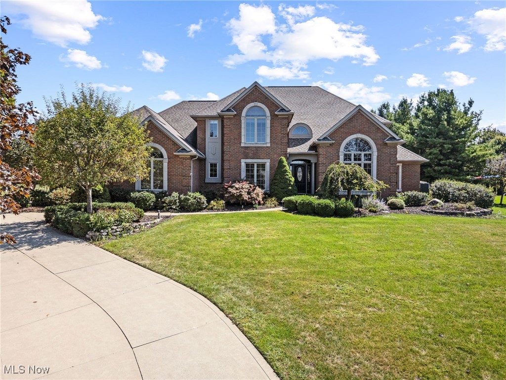 From dinner parties to poolside weekends, this Nobles Pond home is built for luxury living and entertaining in style! A grand 2 story foyer makes a memorable first impression, flanked by a private home office with French doors and a formal dining room with a tray ceiling. Step into the great room, where a soaring ceiling, gas fireplace, and Palladian windows create a light filled gathering space.
In the kitchen, Schrock oak cabinetry, granite countertops, and stainless steel appliances including a Frigidaire Gallery refrigerator and double wall ovens are ready for the serious cook with a prep island and breakfast bar seating adding to the appeal. Just beyond, the casual dining area flows into a vaulted sunroom and opens through French doors to a covered patio, perfect for summer meals. Another set of French doors leads to a maintenance free deck overlooking the 24' x 38' inground pool and patio, an inviting spot to gather with friends and family.
A laundry room with cabinet storage, washer and dryer, and a half bath sit in the hall leading to the attached 3-car garage. Upstairs, a junior suite offers a walk-in closet and private bath, joined by two additional bedrooms connected by a Jack-and-Jill bath.
Downstairs, the finished lower level is ready for entertaining with a rec room and wet bar, theater room, and a full bath. Additional highlights include a whole yard irrigation system, a new furnace, A/C, and a prime cul de sac location in Jackson Local Schools. Call to tour today!