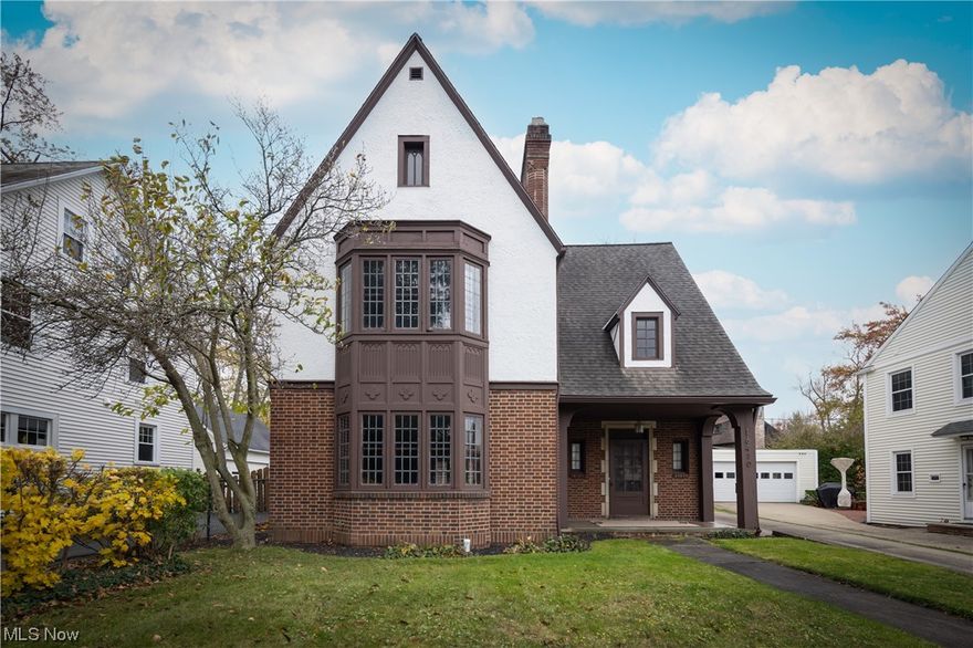 Nestled within the Shaker Heights' charming Onaway Neighborhood, this Art Deco Tudor home exhibits the beauty of Shaker Heights. The home has beautifully refinished hardwood flooring, original windows, 9 foot ceilings adorned with ornate plaster ceiling medallion lights throughout the rooms. Set on an 8,700 sq.ft
lot, which features a brick patio, fenced backyard and 2 car detached garage. Walking distance to the schools and less than a half mile from the police department, grocery stores and rapid transit, combining the convenience of city living and tranquility of the suburban oasis. This Home has had a Shaker Heights Point of Sale inspection and it has passed and is complete.