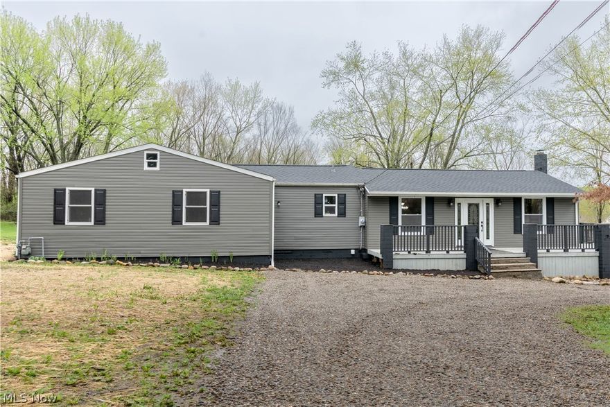 This cozy updated large ranch sits on a beautiful one acre lot at the end of the road.  This 4 (potential 5th) bedroom home offers convenient first floor living.  Enter this home off a wrap around deck to the enormous Vaulted Great room (21x31).  This room has a gas fireplace and a lot of windows to let the natural light in.  Off the Great room is the kitchen and Laundry room.  Down the hall is a large inviting full bath with oversized shower and tub. This bathroom also has a private toilet area with a pocket door for privacy. The master bedroom has a secret walk in closet.  Push the bookcase in to discover the master closet. The first floor also has a private wing with the last 2 bedrooms on the first floor.  Currently being used as a bedroom and playroom with a really cool slide and clubhouse in the attic.   The walk out lower level offers 2 bedrooms, full bathroom and oversized rec room with built in bar, and gas fireplace.  Enjoy your evenings relaxing in the hot tub on patio or ar