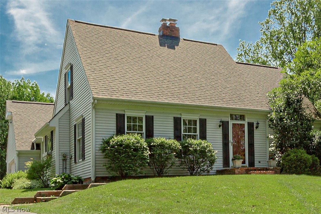 Perched on a wooded knoll, this Cape Cod colonial is a unique property of charm and character. Constructed by a builder for his own family, this one-owner home has been loved for many years. Wonderful opportunity to create a new legacy of memories! Entry Foyer leads to a large sunlit Living Room. Delightful Kitchen with Island and pantry cabinet. All Kitchen appliances are included. Sizeable Dinette area opens to a cozy Family Room, perfect for quiet evenings with a good book, or to enjoy special guests by the Fireplace. First floor Laundry includes utility sink, and washer & dryer, and doubles as a mudroom which leads to the 2 car side-loading attached garage. Master Bedroom on the main floor, featuring walk-in closet, full bath with soaking tub & separate shower. Two generously oversized bedrooms, with additional full bath, highlights the second floor. Ample closets and attic storage galore. Full basement features both finished and unfinished areas, allowing for play space or exercis