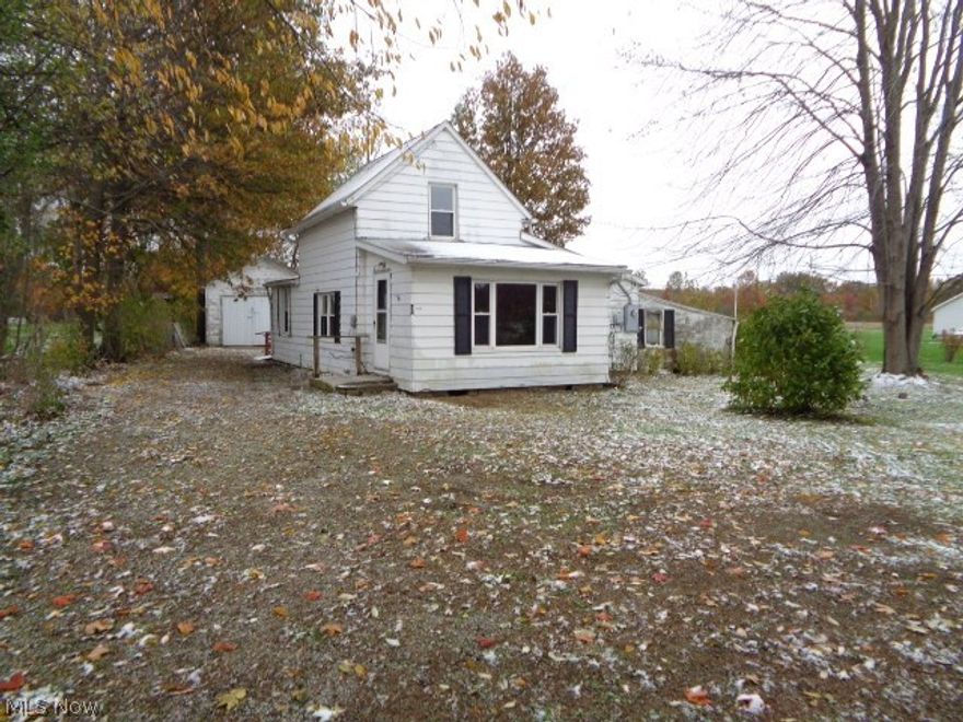 Amazing opportunity to own a property in Grafton on 0.60 of an acre.   This home offers five rooms, two bedrooms and one full bathroom with a total of 1001 Sq Ft of living space.  Outside the home has a deck and an over-sized one car garage.  Sits back off the road and is somewhat private.  Property does need repairs and updates on the interior and exterior.