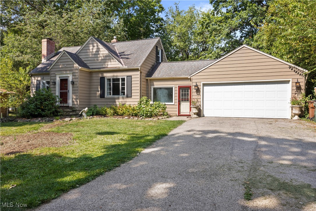 Charming Westlake bungalow situated on nearly an acre of fully fenced yard, offering privacy, space, and a serene setting surrounded by mature trees and native plants. Two convenient entrances welcome you, one close to the driveway/garage-that enters into a mudroom with a new Andersen sliding door to the backyard, and the other through the main entry. Inside, the completely updated (2024) kitchen shines with stainless steel appliances (2023), a gas connection, and fresh paint (2025).
The spacious living and dining areas feature beautiful wood floors refinished in 2020 and a wood burning fireplace (condition unknown) perfect for entertaining or relaxing. A first-floor bedroom and full bath, complete with a new vanity and fresh paint provide flexibility for guests or main-level living. Upstairs, you'll find a large loft and a comfortable primary bedroom. Additional improvements include a new garage door (2025), a rebuilt exterior chimney, Furnace/A/C (2022), and the inclusion of a washer and dryer. The homes deep lot sits back from the road for added privacy, while its location offers quick access to major highways, shopping, and dining. Move-in ready and thoughtfully updated, this home combines classic charm with modern conveniences.