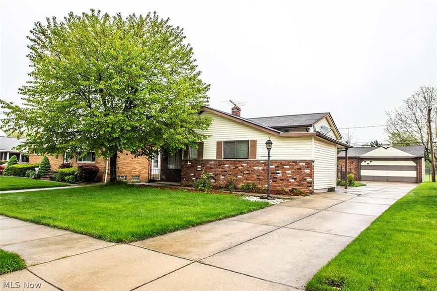 This attractive split level home is larger than most and has the ideal West Park location a stones throw from the Metro Park! Step inside to find a great floor plan flow featuring sizable living room, kitchen with all appliances and expanded dining space perfect for gatherings! Upstairs you will discover an updated bath and 3 bedrooms including master with twin closets!  The lower level offers spacious family room with gas fireplace, laundry room, full bath and ample storage! Walk out from lower level to yard with large 2.5 car garage that backs to park! Electric panel has been updated! One year home warranty is included! Don't miss this one!