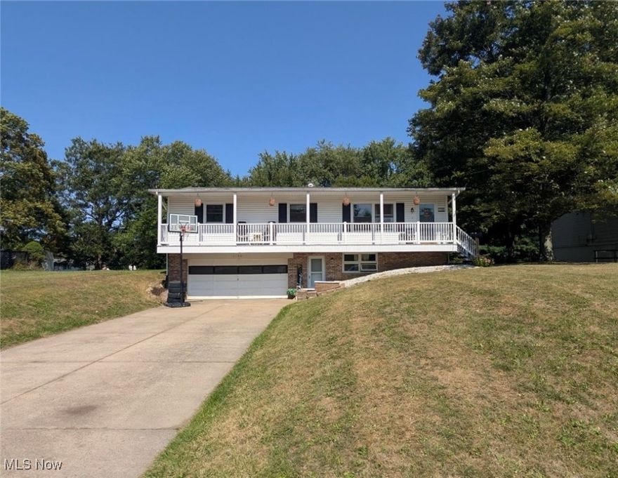 Welcome to 1180 Jones Drive! Enjoy the simplicity of single level living while being tucked away in a quiet neighborhood! From the minute you pull into the driveway you will notice the charming full length covered front porch! Step inside where you're greeted with open concept living with the living room leading right into the eat in kitchen! Off of the kitchen glass doors lead out to the deck and back yard space, perfect for relaxing or entertaining. Off of the living room you will find 3 bedrooms, a full bathroom, and the convenience of first floor laundry! Enjoy more living space in the partially finished walk out basement that also has a full bathroom! Updates include new furnace and A/C 2024, new dishwasher 2025, and new hot water tank 2023! Call to schedule your showing today!