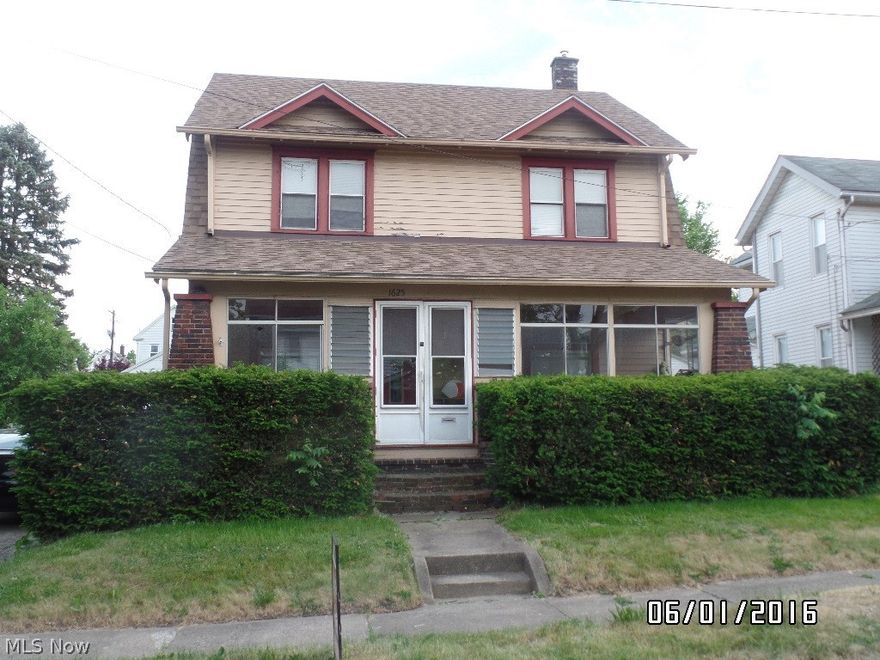 This spacious 3 bedroom home with walk up attic is owner occupied and in complete livable condition. Enclosed front and back porches. Classic interior features include gorgeous faux fireplace in living room, wide crown molding, custom wood built-ins throughout and pocket doors still present.  Updated kitchen with all appliances (including dishwasher) staying. Washer and dryer stay. Updated roof, furnace, breaker box and many windows. Central air! Just a little paint here and there will make this a great home or investment property. Best buy on the westside. Call for your appointment