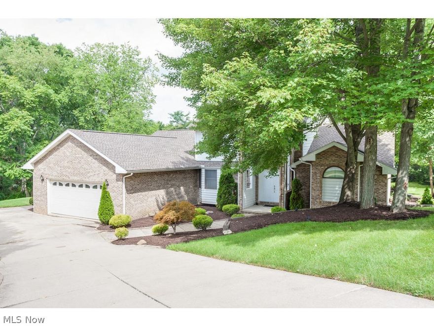 Updated contemporary home in a private Lake of the Woods cul-de-sac location. 4-5 bedroom house with a first floor master and 2 additional bedrooms on 1st floor. 2nd floor features loft and additional bedroom. Finished walk out lower level featuring an additional full kitchen/bar and a possible 5th bedroom. Beautifully enclosed back deck overlooks back yard and woods.