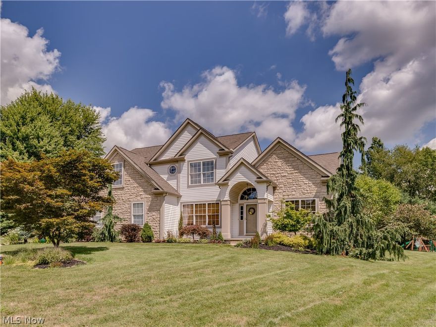 Lovely & well maintained 4 bedroom, 3.5 bath on private cul de sac lot  with approx. 3044SF including finished lower level* Open & spacious starting with vaulted entry with Palladium window, plant ledge & wood floor opening to the vaulted great room with gas log fireplace and  built in shelves* French doors from great room to den* Formal dining room with chair rail, crown molding & new carpet* Kitchen is sure to please with granite counter top, glass tile back splash, wood floor, roll out shelves, pantry, island & fully applianced* Breakfast room with wood floor, built in desk & slider to deck* Hallway & half bath with wood floor* 1st floor laundry with utility sink, cabinets & access to back yard & garage* Vaulted master with sitting room & walk in closet* Master bath with double vanity, separate shower, jetted tub & ceramic floor* Additional 3 bedrooms & guest bath complete the 2nd floor* Newly finished rec room with built in counter/cabinet with corian, stone wall with electric fireplace & full bath with vessel sink & ceramic floor* Other features include central vac, speaker system (great room, dining & kitchen), 6 panel Masonite  doors, ceiling fans, glass block basement windows, above ground heated pool (6/2014), & tile patio overlooking private back yard* Wonderful setting* Home warranty provided*