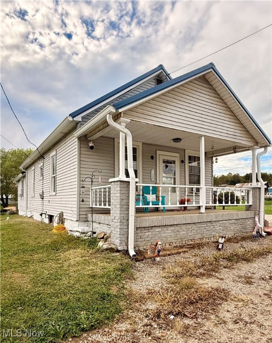 Motivated sellers are now in their new home giving you the opportunity to be in yours before Christmas.  Move in ready this adorable three bedroom 1 bath home is ready for you! The layout and size of this home offers a great space for first time home buyers or retirees looking for an entry level floor plan, low maintenance, an ideal location outside of town, with the conveniences of public water & sewer.  The kitchen boasts the perfect combination of workspace and storage space with the ideal spot for the dinning table and chairs.  The fireplace in the living room makes a welcoming spot for entertaining guests or relaxing with the family. The master offers a large walk in closet /dressing room.  Main floor laundry room.  The basement is a bonus spot for storing the holiday decorations.  A new 12x20 pole building/shed was completed last week, other recent renovations include the metal roof and gutters, many replacement windows, paint and flooring.  The combined two tracts provide nearly half an acre on a corner lot making for an easy commute to State Route 13, 669, 22, and 93.