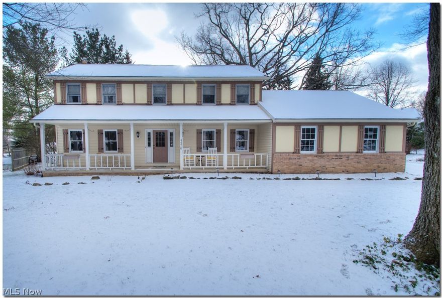 Welcome Home to 4 bedroom colonial on cul-de-sac, wooded lot. Kitchen features 2-tone glazed maple cabinets, Corian countertops, pot filler faucet over gas stove, stainless steel appliances, marble back-splash, bead-board ceiling. Newer flooring through out. The family room has a bay window and gas fireplace. Bathrooms with granite counter-tops. Half bath w/granite flooring and full baths have ceramic tile. 1st floor laundry room with door leading to the exterior back yard paradise.  Relax on the covered front porch, the deck topped off with a pergola or the paver patio surrounded by mature trees. Beautiful setting, great location!