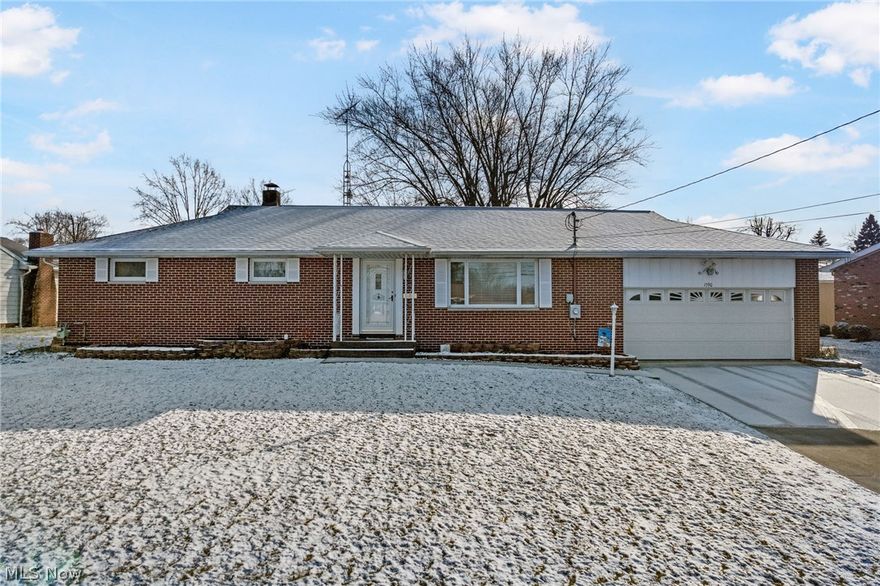 It's your lucky day! This bright and cheery brick ranch is in mint condition and ready for you! Featuring 3 bedrooms, 2 1/2 baths, spacious great room w/gas fireplace. Formal dining room with built-in corner cabinet and buffet. Newer appliances, built in pantry, access to a wonderful 3 season sun room for entertaining or everyday living.  Spacious 2 car garage with attached workshop/man cave - lots of convenient and fun possibilities. Master bedroom with 1/2 bath and first floor laundry (could be converted to a full bath). Beautiful lot with partially fenced yard and garden shed. Public utilities, concrete drive, beautifully location. You will love it!
