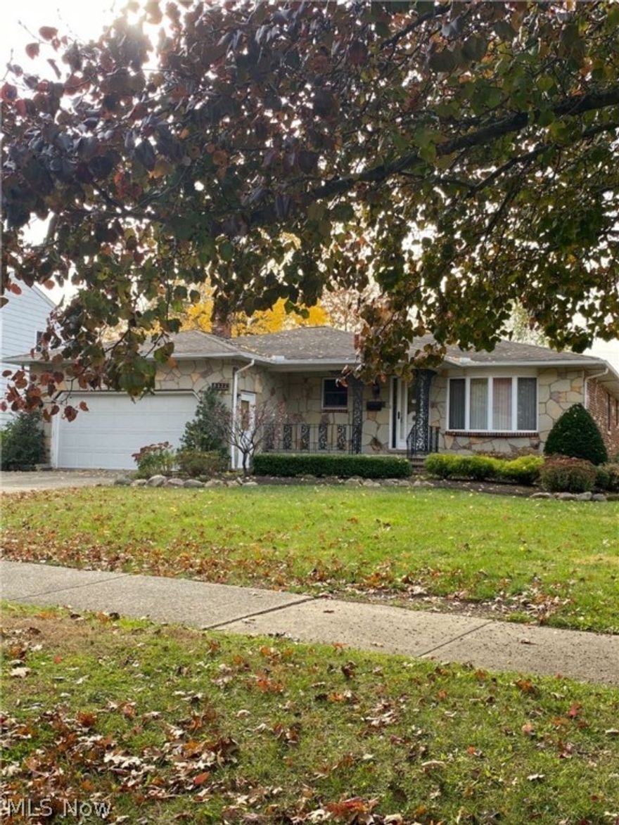 Custom designed and built, 1 owner home, in need of some updating and decorating. This hard-to-find ranch boasts a brick and stone exterior and encompasses 1,785 sq. ft with a full basement and spacious attached two car garage. This house has a beautifully landscaped front yard and a large, fenced backyard with a defined garden area, apple trees, and gardening shed. Located on a quiet street, in a great location, within minutes of shopping, dining, and entertainment near downtown Willoughby, not to mention it's exceptional location to freeways. Imagine spending winter evenings in the over-sized paneled family room in front of the large stone fireplace, surrounded by a custom stone wall. Main floor has a laundry room with a half bath off the kitchen for convenience. The basement has a large, finished rec room and full bath, extra laundry area, kitchen area, and a bonus room perfect for an office. There is also a large storage room in the basement. The City POS has passed except for some