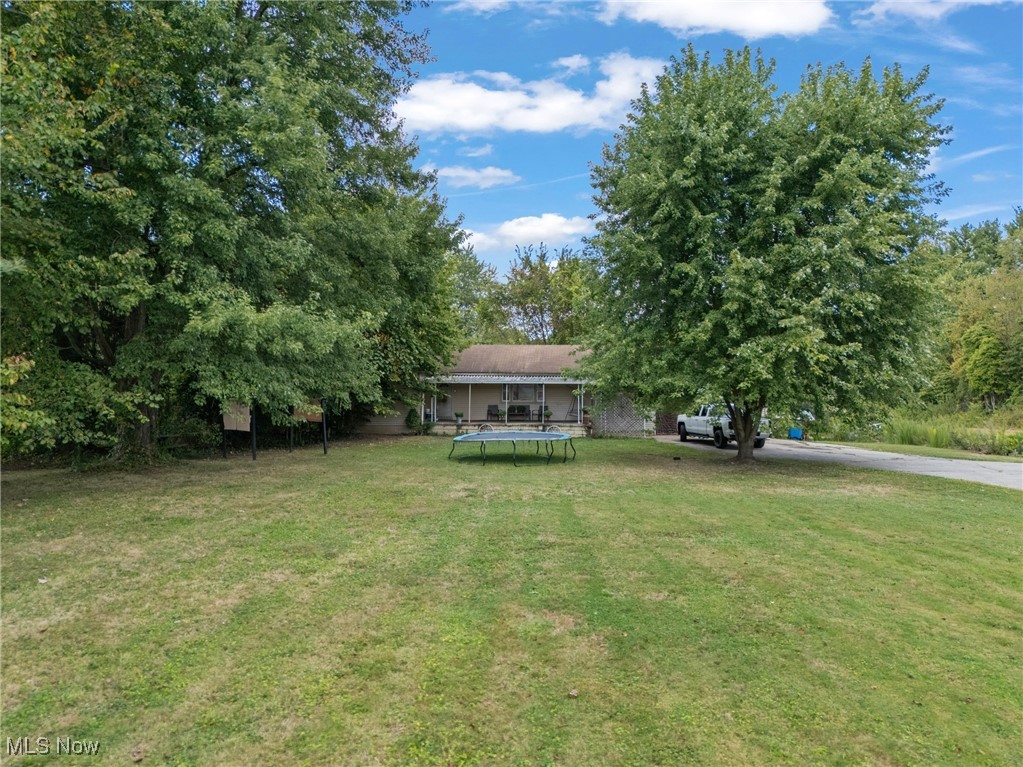 AUCTION DATE: WEDNESDAY, October 15th, 2025 AT 5:30PM. You can preview this property at this OPEN HOUSE/PROPERTY WALKTHROUGH DATE: 10/15/25 - 3:30-5:30pm. DON’T MISS THIS OPPORTUNITY!!! Perfect place to build your new home. Lots of privacy and room to grow. Great property with 2.94 acres. Dimensions are 125’x1031’x 995’x81’. There is a well and septic on the property. This property is being Auctioned of as part of an estate. The current owner does not have details regarding the condition of the well or septic system. The home currently has tenants living there, so there are no showings on this property. The tenants are in the process of relocating. There is a home on the property (which needs a lot of work) but most likely will be a tear down. Value is in the land. Seller reserves the right to accept a pre-auction offer prior to auction day. Any inspections desired by a buyer are to be completed prior to fully executed purchase contract at buyer's expense. Property Sold Where Is-As Is.