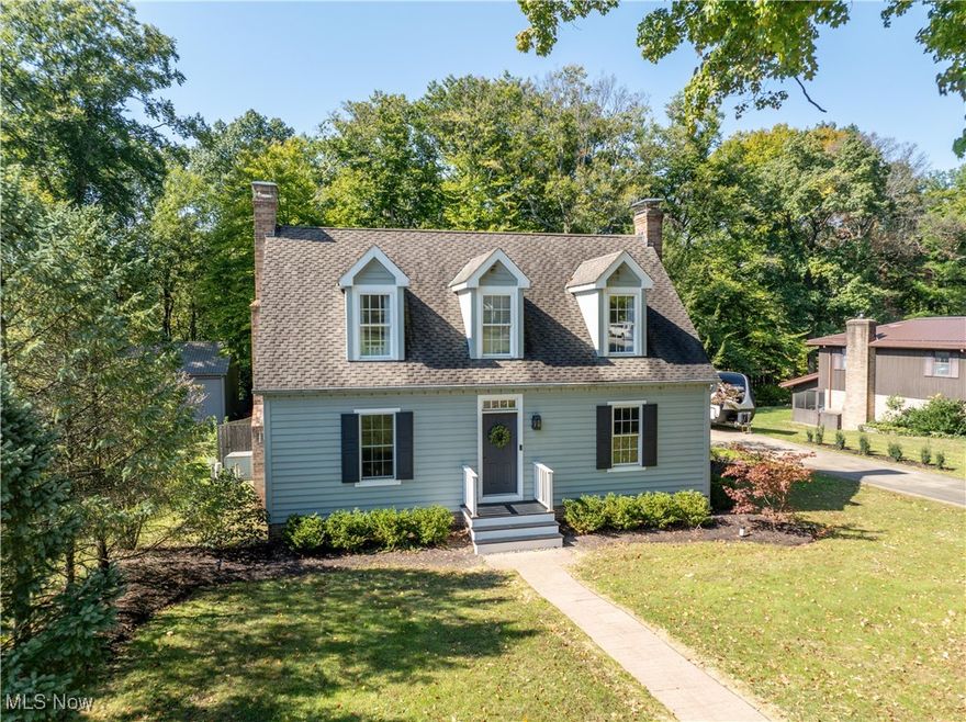 Welcome to 11006 Northwood in Bolivar, where historic charm blends seamlessly with modern luxury. Modeled after the Bracken House from colonial Williamsburg, this home captures the elegance of the past while offering today’s conveniences. The main floor features soft pine flooring with rod iron nails, flowing throughtout.The kitchen, remodeled in 2021, is a chef’s dream with Alpine cabinets, Cambria quartz countertops, subway tile backsplash, & island with a beverage center. A hidden coffee station, farmhouse sink, smart lighting controls, pull-out shelving add both charm and function. A paneled Beko dishwasher and dual-fuel range, complete the space.The adjacent family room boasts a coffered natural beam ceiling and a masonry fireplace with a cooking arm. There are three woodburning fireplaces, with gas hookups. A flex room on this level can serve as a first-floor primary bedroom or an office, featuring a walk-in storage closet and access to a full bath and laundry area.Upstairs, three bedrooms, each with newer carpeting and charming dormers. The primary bedroom offers double closets, while a large linen storage closet ensures plenty of storage space.In the basement, a rec room provides the perfect setting for movie nights. The additional bedroom has a walk-in closet and half bath, plumbed for a shower. A semi-unfinished space offers endless possibilities for a home gym, craft area, or workshop, complete with cabinets, sink and 2nd laundry hookup.Outside, the cedar and brick exterior is complemented by a covered porch connecting the home to a two-car garage with 30-amp electric. The half-acre lot features a brick paver patio and tree-lined privacy at the back.This home also boasts modern mechanicals, including wiring for generator,HVAC replaced in 2017 & Central air in 2018. Flek water softener system and an April Air humidifier. Every detail has been thoughtfully designed to provide an exceptional living experience. Subject to seller finding suitable housing.