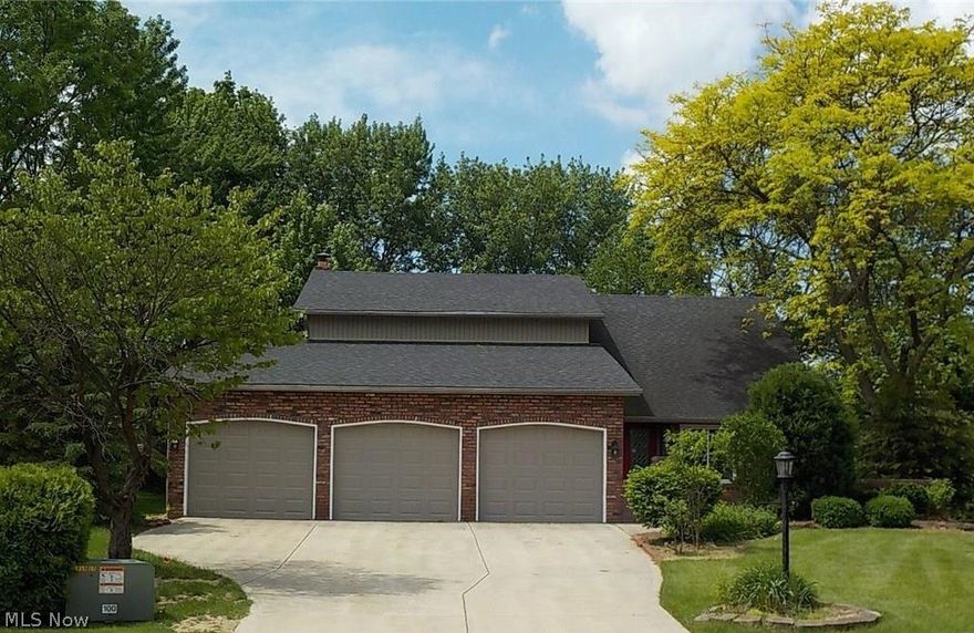 Gorgeous Contemporary home with gleaming hardwood floors, vaulted ceilings, tile flooring in the grand foyer with curved staircase.  Double glass entry doors invite guests into the foyer with access to the large living room. Formal dining room located off the eat-in kitchen with granite countertops and stainless appliances.  Large family room with wet bar and a stone fireplace.  First floor office with french doors.  Lots of natural light on the first floor with custom brazilian hardwood throughout.  Finished rec room and bar in lower level with an additional bonus room with plenty of storage. Huge wrap around deck in rear.  3 Car garage with openers. Ready for move-in!