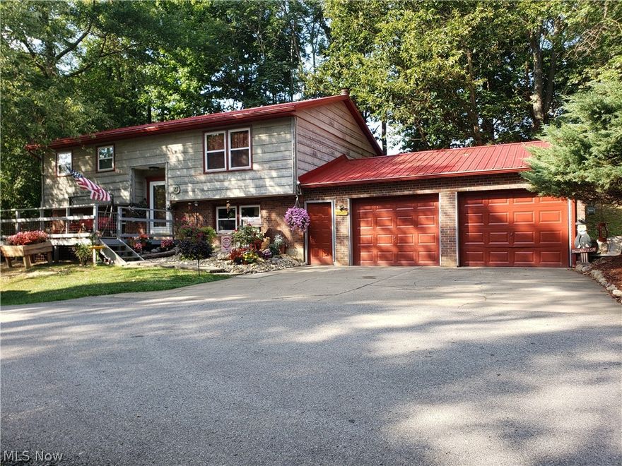 Want to feel like your out in the country, but close to town and all the amenities... Look no further!! This property is last house on end of Sleepy Hollow Dr. hidden away for your peaceful way of living. Many updates to this house including a brand new roof, windows, furnace and A/C. Spacious rooms & storage. Enjoy the oversized front and back decks for all your outdoor enjoyment. You may just get a sneak peak of the Shamrock Football team on a home game. Nice deck overlooking the stadium. There are 2 beds upstairs with a full bath, downstairs you have 2 possibly 3 bedrooms, laundry room with bathroom. Rec room for entertaining. Nice 2 car garage and also extra parking for your guests. Right beside football stadium. Close to Park, schools, grocery stores. Don't miss out on this wonderful property!! Call Today!!