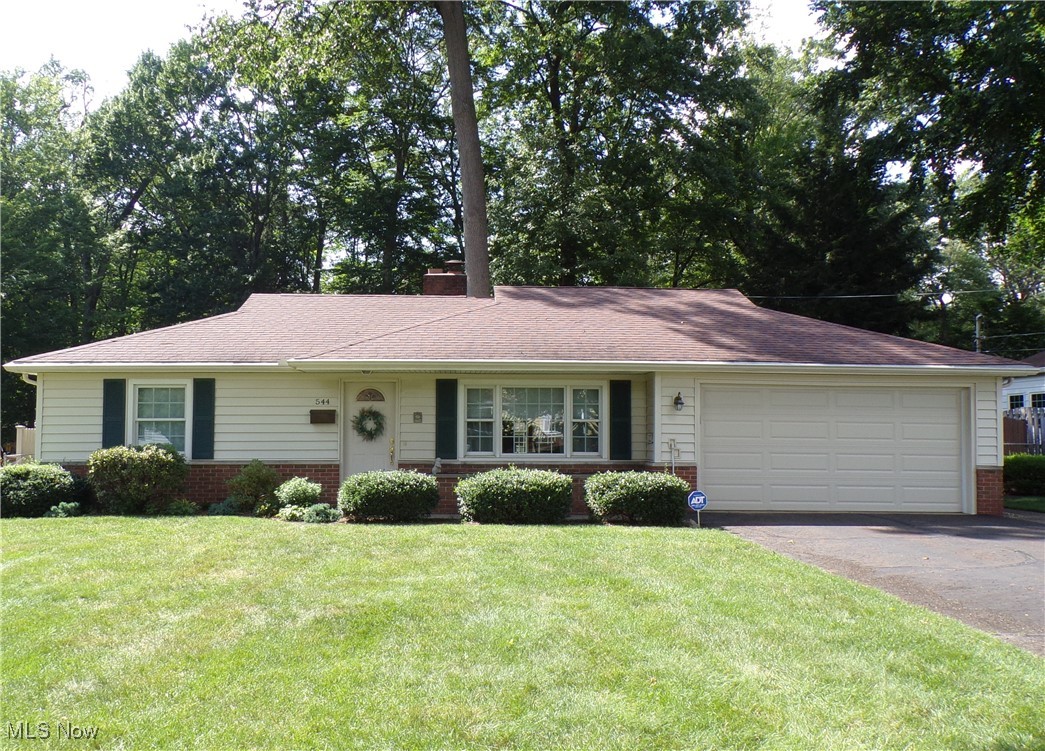 Welcome to 544 Beech Drive! This ranch has been beautifully maintained and shows like a model! If you are looking for one floor living and want a home that is move-in ready this is the perfect home for you! Or, if you were thinking of moving from your large 2-story home to a condo, this home may be the perfect alternative! It boasts two roomy bedrooms, a cozy living room with a fireplace that has been converted from wood burning to gas - w/newer gas logs, and a beautiful oak mantle! In 2018 the owner added beautiful engineered hardwood floors to the living room, hall, and kitchen, and added carpet in the two bedrooms. The Family room flooring was also replaced with beautiful upgraded carpet. The eat-in kitchen boasts stainless steel appliances (2017) and offers beautiful oak cabinets, and includes a pantry. The large first floor laundry has a closet, cabinets for storage, a sink and a counter for folding your clothes, And, there is a door that leads to the side yard. The back yard is large and is fenced, and includes a privacy fence on both sides of the house. There are two barns for extra storage, garden tools, mower, etc. The attached garage has a newer garage door and the garage door opener (Lift Master) was replaced in October of 2024. The Trex Deck was installed in 2015 and is in excellent condition. There are two furnaces - an additional furnace was installed when the family room was added, and it was replaced in 2013 along with 2 air conditioning units. The furnace for the main house was replaced in 2003 but both furnaces are serviced every year by Brandon Heating. The roof was replaced in 08/2010 w/a complete tear-off, and in 2024 new gutters were installed. The H20 was replaced in 2017. There are 22 Anderson windows in the home. The owner has lived in this home since 1989 and has lovingly maintained this home! In addition the owner is offering a one-year home warranty for the buyer's comfort! Call today for your appointment before this one slips away!