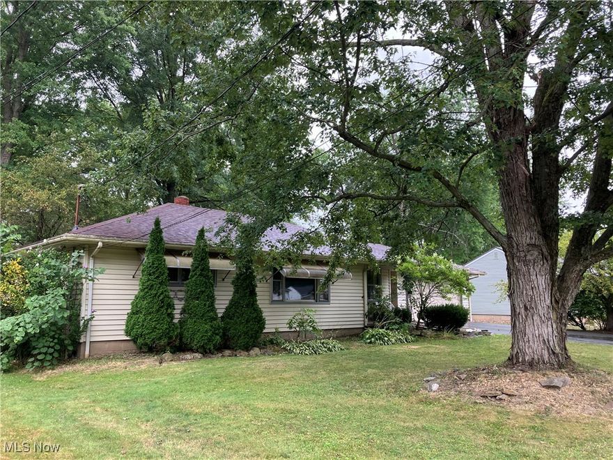Opportunity is knocking with this nice three bedroom, one bath ranch-style home featuring a large living room for entertaining, spacious eat-in kitchen with appliances, stunning hardwood floors, year-round Florida room off the back, full basement and attached two-car garage. You'll spend plenty of time on the patio and in the private yard featuring a large outbuilding/workshop with electric and heat. Additional highlights include a brand new roof, central air and gas heat. This property offers immediate occupancy, making it move-in ready. Call for more details.
