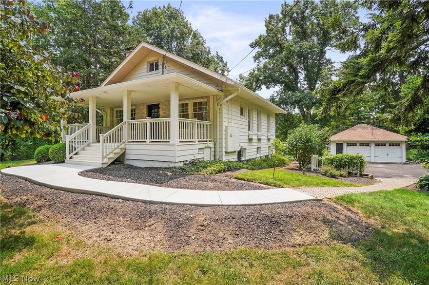 The vibe of this country-classic craftsman styled home will keep you wanting to stay home every day! Relax in the backyard oasis with beautiful landscaping on over a 1.6 acre piece of land, yet still be so close to downtown Hudson and the Hudson Park! This cape style home is much larger than it appears from the street. The seller has upgraded just about every feature, including flooring, roof 2022, gutters 2022, new HVAC in 2020, kitchen, bathrooms, ceilings, patio's, porches, and more! The fine details in this home will tell everyone that this isn't the normal cookie cutter house. The kitchen has an Italian Ilve gas stove, soapstone counters, a farmhouse sink, beautiful ceramic backsplashes that continue on a wrap-around counter that extends to the dining room, where you will also find a built-in wine fridge, glass cabinets and glass cabinet knobs. Three bedrooms are on the first floor with one full bathroom, which is tiled with the same tile as the kitchen to continue the theme. One of the bedrooms is being used as an office. Upstairs you will find a large bedroom with a full bathoom with built-in storage and skylights. The living room has wood ceilings and the most beautiful wood burning fireplace with a hand hewn mantel and granite hearth. The architectural design of the wood wall features just add another layer of interest. Downstairs you will find a spacious finished rec room with a ventless wall fireplace, a half bathroom and a laundry room. The rec room leads out to a stone covered patio to enjoy the views of that gorgeous, landscaped back yard. There is so much storage in that basement as there are multiple rooms.