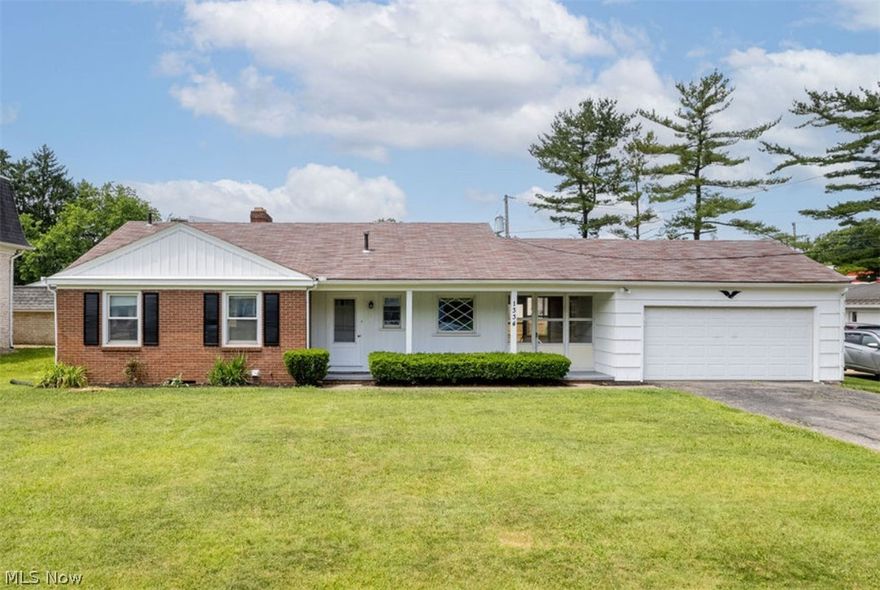 Be sure to check out this updated Ranch Style Home with a fully fenced in Backyard!   The home's original hardwood floors are warm and welcoming as you enter the living room.  ALL THREE BEDROOMS ALSO HAVE HARDWOOD FLOORS! The Owner's Bedroom includes 2 closets plus built ins! The newly remodeled half bath is perfect for when having guests over! 

This home includes an eat-in kitchen plus a dining room which could also be a 4th bedroom or a home office as it includes a closet or could be used as a pantry. 

Off of the enclosed porch you can access the deck, the patio and your garage! 

You will love relaxing on your covered front porch.   

Full Basement with a Fireplace awaits your refinishing touches! Updates include: Furnace & A/C - 5 Years Old, Hot Water Tank 2Years old. Newer Flooring in non-wood floored rooms.  Fresh paint - this one is move in ready!