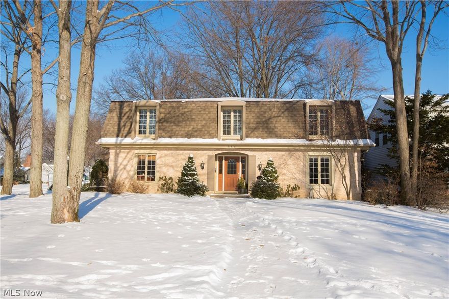 Prepare to be Moved!...into this beautiful brick colonial in the very desirable Huntington Woods subdivision of Bay Village. All the room you could want and more. Formal living room and dining room in soft, neutral tones set the stage for gatherings with family and friends. Updated eat-in kitchen features newer appliances, cabinets, countertops and beautiful hard wood floors. The stone fireplace/hearth is the focal point of the adjacent family room with large windows providing tons of natural light. Relax in the inviting sunroom that overlooks the expansive stamped concrete patio which provides a peaceful retreat with wooded views. 1st floor office (or optional 5th Bedroom), laundry room with closet and half bath complete the first floor. Upstairs, the elegant Owners’ Suite offers in-suite bath with dual-sink vanity, shower and walk-in closet. Three additional generously-sized bedrooms with ample closet space share the second full bath. Updated lower level rec room is ready for gatheri