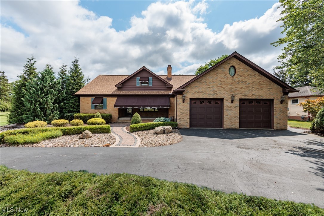 Welcome to this beautifully maintained 4 BR, 2.5 BA brick Cape Cod, nestled on a picturesque 1.37-acre lot * 3,498 sq ft of finished living space * A horseshoe driveway provides easy access and curb appeal * Spacious Living Room features a cozy gas fireplace * An open-concept Kitchen includes granite counter tops, an ample amount of cabinetry, a pantry and appliances that remain * Off the Kitchen is a Sun Room filled with natural light * A sliding glass door that leads to one of four separate patios * Formal Dining Room * 1/2 Bath on the first floor * Two Bedrooms located on the first floor with an updated Full Bathroom with granite tops and a walk in shower * Paver walkway to the front door and the cozy covered front porch * Sprinkler system * Private backyard is lined with mature evergreens offering a peaceful secluded setting and $60K in landscaping around the home * Two huge Bedrooms on the second floor as well as another Full Bathroom with a tub * Tons of attic space * Basement includes glass block windows, a shower, newer HWT, newer boiler, newer sump pump, tons of storage and a dryer that remains * A 20 x 36 barn with a concrete floor and a charming porch swing off the barn’s patio, plus a shed at the back of the wooded lot for extra storage or workspace * Newer garage door opener * Newer roof with gutter guards * Classic design, modern updates and tranquil outdoor living make this property truly special - don't miss this opportunity to make it yours !