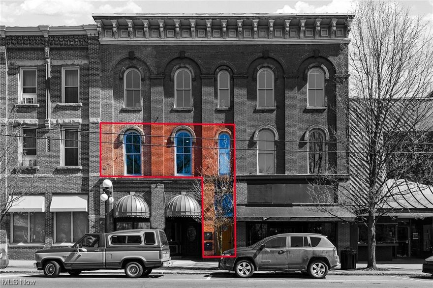 Don't miss out on this beautifully updated, industrial-feel, 2 bedroom, 1.5 bath condo with amazing view of downtown Warren square.  You will love the 12 foot ceilings with floor to ceiling windows that let in amazing natural light.  Enjoy relaxing in the large open concept living room with electric fireplace and attached half bath.  This condo has beautiful exposed brick walls, an open floor plan, wood laminate flooring throughout, and an in-unit washer and dryer.  The kitchen has gorgeous cabinets, granite counter tops, and stainless steel appliances.  The Master bedroom also have exposed brick walls and plenty of closet space.  The building was built in 1900 but condo built in 2019.  There was no mistake - HOA is only $80 a month.  No need to worry about the condo being on the second floor, there is a chair lift available if needed.  Off-street parking provided.  Location is conveniently located near great local coffee shops and restaurants.  Don't miss out on this one!  Schedule yo