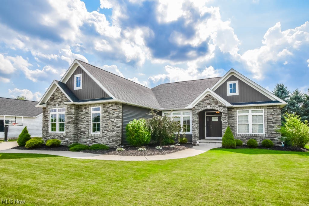 Why wait to build when you can move right into this incredible, like-new ranch in the highly desirable St. James neighborhood! This AC Construction build is full of the finest finishes that are sure to impress the moment you arrive. Just off the foyer, you'll discover a designated home office, providing a private workspace enclosed by French doors. The open and spacious living area features a striking 12' coffered ceiling throughout the great room and gourmet kitchen. The kitchen is a chef's dream with its upgraded stainless steel appliances, stunning granite countertops, subway tile backsplash, and custom soft-close Shaker style cabinetry. Enjoy meals at the oversized island or gather in the bright and inviting dining room, boasting a tray ceiling and patio door access to the covered back porch and fully fenced yard. The split bedroom design ensures privacy, with the owner's retreat offering a walk-in closet and a spa bath, complete with a whirlpool tub and a separate shower with a be