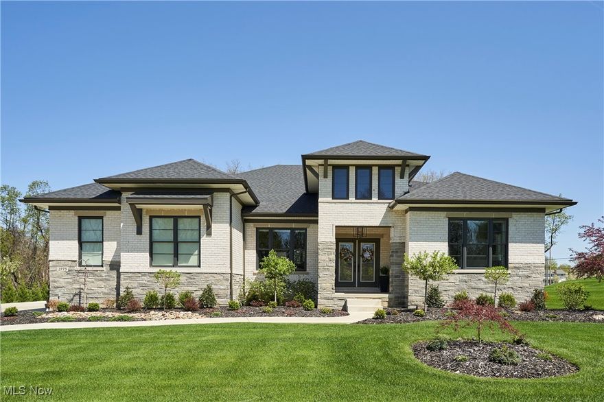 Welcome to this stunning 4-bedroom, 4-bath Ranch in Hinckley's desirable Wexford neighborhood—formerly a Drees Model Home and packed with premium upgrades! Step inside to soaring 10-foot ceilings and a vaulted family room with fireplace, drenched in natural light from a full wall of windows that frame views of the covered outdoor living space, with its own fireplace and serene forest backdrop, perfect for year-round entertaining. The chef’s kitchen is a showstopper, featuring an oversized island with waterfall quartz countertops, double-stacked cabinetry, stainless steel appliances, and a spacious walk-in pantry. The main level offers a luxurious owner’s suite with a spa-inspired bath and huge walk-in closet, plus a second owner’s suite, a third bedroom, private office, large mudroom, and laundry room. The fully finished lower level adds over 1,200 sq ft of living space, including a rec room, custom bar, 4th bedroom with egress window, full bath, workout room, and more. Additional highlights include a 3-car garage, whole-home audio system, remote-controlled blinds, reverse osmosis system, and concrete drive pad, new landscaping, and humidifier. This home is an entertainer’s dream with thoughtful details throughout. Don’t miss your opportunity to own one of Hinckley’s finest!