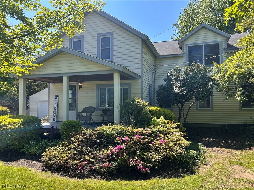 This large 4 bedroom colonial has many updates. It offers plenty of space and comfort for your family. Featuring 2 full baths and a large 21 x 15 great room complete with a free standing wood burner, it's perfect for cozy gatherings. Enjoy the bright 15 x 13 four season room with an cathedral ceiling and sliding doors leading out to a spacious deck. Ideal for entertaining or relaxing outdoors. The entryway leads to the updated kitchen which boasts matching silver appliances that will dazzle your company while making meal preps.  A large garage with the rear pulled through provides ample parking and convenience. This home sits on semi private, large .76 of an acre lot. Spend your evenings on a beautiful open porch and take advantage of the plentiful storage throughout the property. You'll notice recent updates as you tour this home that has a warm, farm type feel. This home is move-in ready. Did I mention, Mentor Lagoons is right down the street!