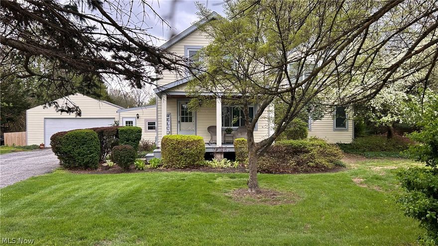 This large 4 bedroom colonial has many updates. It offers plenty of space and comfort for your family. Featuring 2 full baths and a large 21 x 15 great room complete with a free standing wood burner, it's perfect for cozy gatherings. Enjoy the bright 15 x 13 four season room with an cathedral ceiling and sliding doors leading out to a spacious deck. Ideal for entertaining or relaxing outdoors. The entryway leads to the updated kitchen which boasts matching silver appliances that will dazzle your company while making meal preps.  A large garage with the rear pulled through provides ample parking and convenience. This home sits on semi private, large .76 of an acre lot. Spend your evenings on a beautiful open porch and take advantage of the plentiful storage throughout the property. You'll notice recent updates as you tour this home that has a warm, farm type feel. This home is move-in ready. Did I mention, Mentor Lagoons is right down the street!