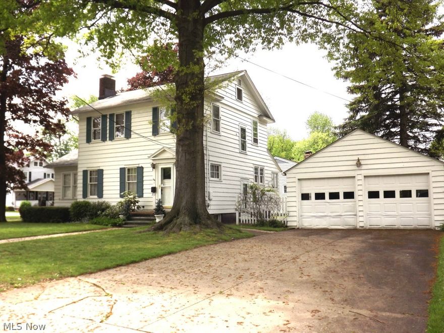 Character abounds in this charming 3 bedroom colonial.  Features include beautiful woodwork, fireplace in living room, full basement and 2 car garage, paved drive, corner lot, walk-up attic.  Family room could also be a first floor bedroom.  Newer furnace and hot water tank. Great curb appeal.