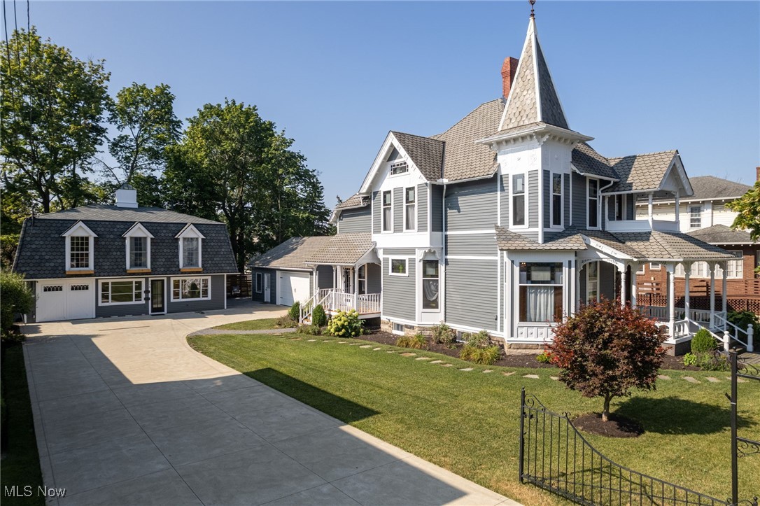 Opportunities like this don't come on the market very often! Income producing property zoned multi-use. Unique Eastlake Victorian style home with a carriage house. Completely remodeled with modern conveniences while keeping its original beauty. Main house is 2402 sq. ft. with 3 bedrooms and 4 bathrooms. Heated garage with shop/office off garage. Stone patio, gas firepit and privacy fence. New full kitchen with all appliances. Original cherry and oak trim, natural wood floors, pocket doors, stained glass windows, bay window, carved butternut staircase, gas log fireplace, full bath with shower and soaking tub. New lighting and roof updated. Carriage house is 1728 sq. ft. is completely remodeled with 2 bedrooms, two bathrooms, full kitchen, kitchenette, water filtration, open space on main floor, two separate entrances. New concrete drive, new roof. Unlimited options with this income producing property right near Medina Square! One year home warranty included for buyers peace of mind!! Call for your private showing!!