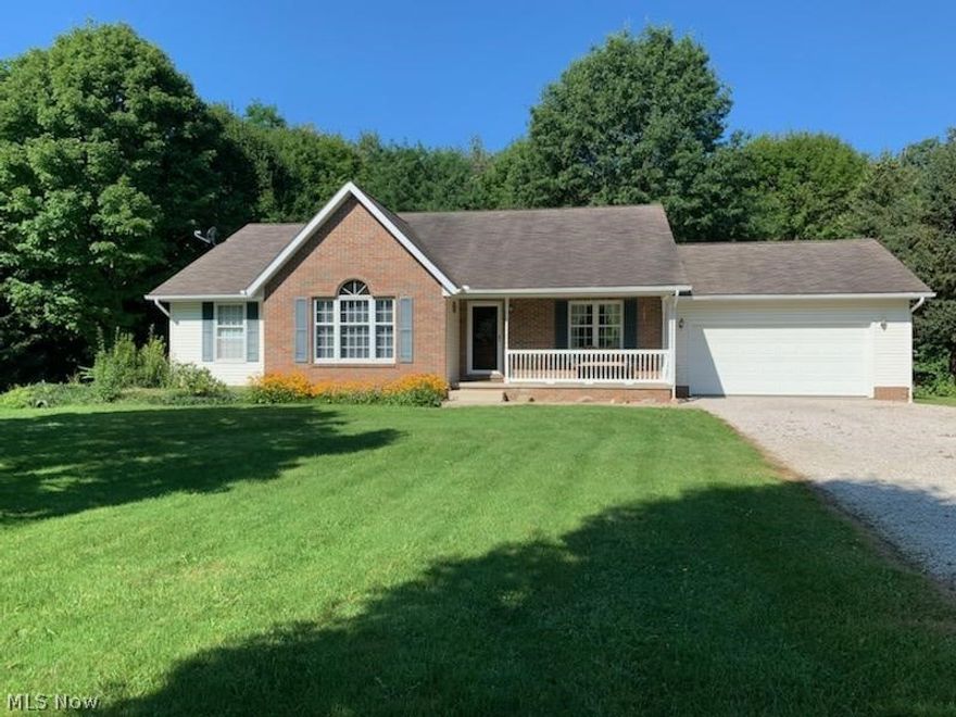 This private ranch is the home you've been waiting for!  Views galore from all of the windows.  Multiple decks allow you to gaze onto your property in all directions.  Your master bedroom has a private bath and an amazing deck!  Your living room has a cozy wood burning fireplace.  The kitchen walks out a grilling deck overlooking the woods.  Almost 6 acres with riding paths for horses!  Three turn-out stalls in barn.  Extra outbuilding 30x36 with water and 220.