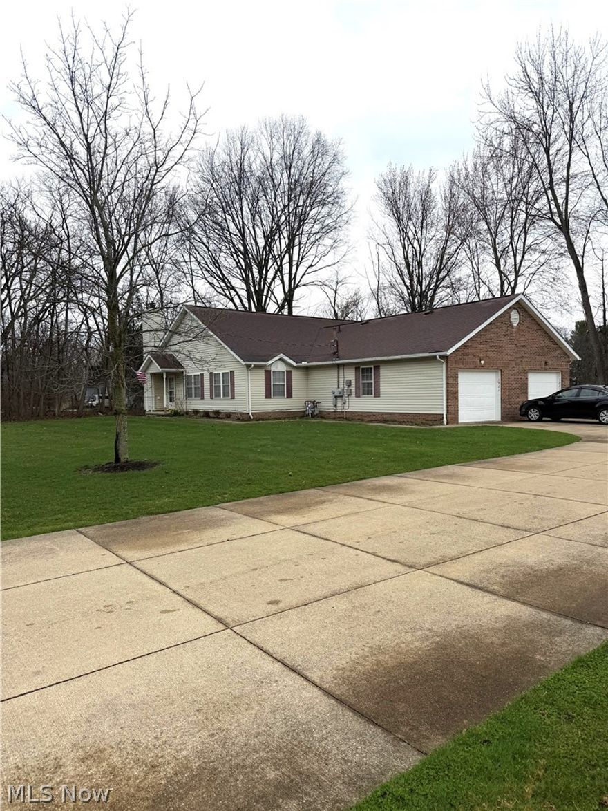 Incredible investment opportunity featuring two well-maintained duplexes on a single parcel, offering a total of four ranch-style units. Each unit includes 2 bedrooms, 1 full bath, an open great-room layout with kitchen, and a dedicated laundry room. All units are built on slabs with no basements, providing low-maintenance living that appeals to tenants. The property sits on approximately one acre and includes an attached garage for every unit. Located in a desirable rental market with an excellent occupancy history, this property presents a rare chance to acquire a stable, income-producing asset with strong long-term potential.