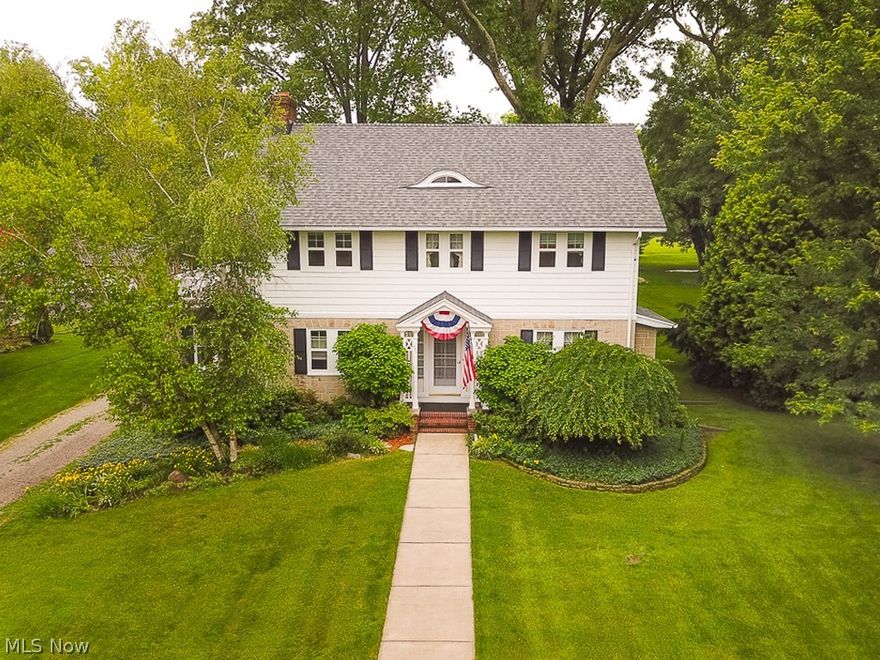 This is "one of those homes" you've always adored the charm and character of when passing through the Village of Wellington! First time on the market! Classic curb appeal nestled on over a half acre lot in town! Beautifully landscaped! Large foyer entry complete with hardwood flooring & gorgeous trim! Tall ceilings abound the main level! Large living room accented by a gas fireplace and windows on two walls. Cozy den w/ beamed ceiling is located off the living room with lots of windows! Formal dining room is charming with crown molding, french doors! The kitchen has been remodeled and offers white cabinets, granite tops, stainless steel appliances, can lights & a great use of space! Charming breakfast nook off the kitchen. One of the best features of this home is the huge 13x23 screened in back porch!Upstairs you'll find 3 nice sized bedrooms and two updated bathrooms! The master bedroom offers a private remodeled full bathroom complete with a custom tile walk in shower! Master bedroom