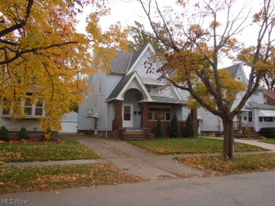 Tudor Style Colonial With Impressive Curb Appeal and Welcoming Front Porch. Huge 3 Bedroom Suites. Natural Wood Floors. Built In Curios In Dining Rooms. Spacious Living Rooms With Fireplaces. Some Remodeling Has Been Started. Upstairs Kitchen Includes New Cabinets and Granite Tops. Bring Your Vision and Your Tools and Make This Home A Show Place!!