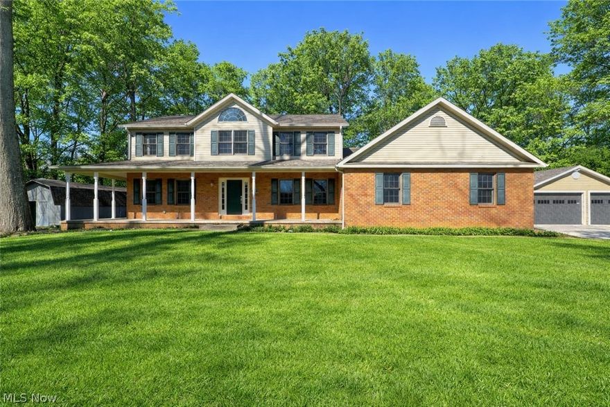 Need space for people, cars, and entertaining? This 6-bedroom home on 1.08 wooded acres offers nearly 4,000 sq ft of living space, a finished walkout basement with second kitchen, outdoor kitchen, and a massive 5-car garage w/ additional car port.

The main level features a spacious kitchen with center island, abundant cabinetry, and dining space, flowing into multiple living areas including a family room with fireplace and access to a deck overlooking the private backyard.

The finished walkout basement provides incredible flexibility with a second full kitchen, recreation space, bedroom, office, and full bath—ideal for multi-generational living, guests, or extended entertaining.

Outside you'll find a great setup for entertaining including a stone outdoor kitchen with granite counters, along with a large deck and patio area.

Car enthusiasts, hobbyists, or anyone needing serious storage will appreciate the massive 5-car garage connected by a breezeway/carport.

Situated on 1.08 wooded acres along a shared drive serving only a few homes, the property offers privacy while still being conveniently located near shopping, dining, and major routes.

Across the driveway sits an in-ground pool with pool house, offering additional outdoor recreation potential.

Homes offering this much living space, garage capacity, and entertaining potential at this price point rarely become available in Springfield Township. Call today to schedule a tour!