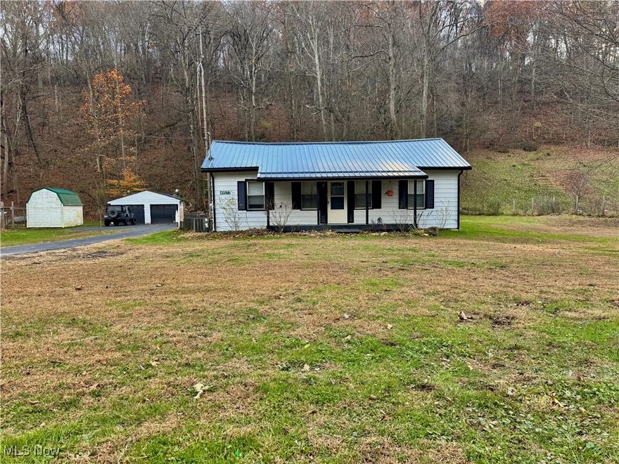 Check out this affordable 2-bedroom, 1-bath aluminum sided home with great potential! This property offers a large living room, eat-in kitchen, and convenient main-floor laundry. Sitting on 1.4 acres, it includes a 2-stall detached garage with 100 amp electric panel & electric garage door openers, and storage shed for all your tools and equipment. Home features propane heat, central A/C, 50 gallon water heater, private well, and septic system. Updated metal roof, some replacement windows, blacktop driveway, With some TLC, this could be a wonderful full-time residence, rental, or country getaway. Peaceful setting with plenty of room to enjoy outdoor living — just minutes from town amenities. Taxes are $936/year  Call for your private viewing!