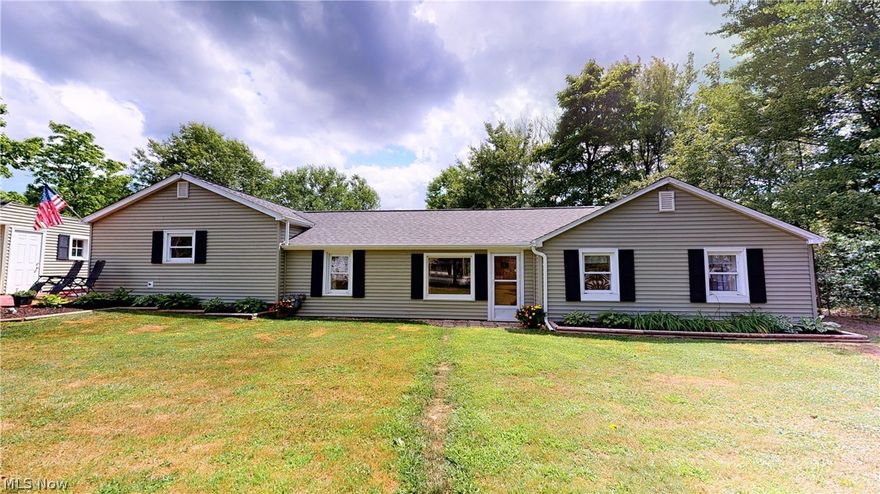 If you have been waiting for updated, single floor living with a large, private yard then your wait is over. This move-in ready, three bedroom, two full bathroom ranch home in the Chardon Local School District sits on 3.01 wooded acres and offers a brand new roof and gutters (2020), updated master suite with new master bathroom (2019), updated kitchen (2017), newer furnace and central air, an updated electrical panel, and so much more. The kitchen was completely gutted and remodeled in 2019 and a large pantry with custom hand-built barn door was added just off of the side entryway. The second full was updated in 2017 with new flooring, fixtures, vanity, and more. Off the back of the home is a large outbuilding than is finished inside and can be used as a workshop, for additional storage, flex space, or just about anything. This home includes a one-year Cinch Home Warranty for the new buyer and is ready for you to call it your own. Schedule your showing today before it's too late.