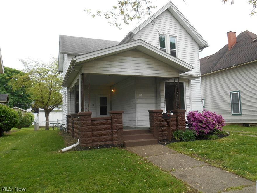 Lovely 2 story home with an inviting front porch, 3 bedrooms, 2 baths, fenced back yard, large detached 4 car garage and front and back off street parking. Improvements include: Electrical updates, newer flooring, windows, bathroom updates, exterior doors and custom window coverings. Clean and ready to move right in!